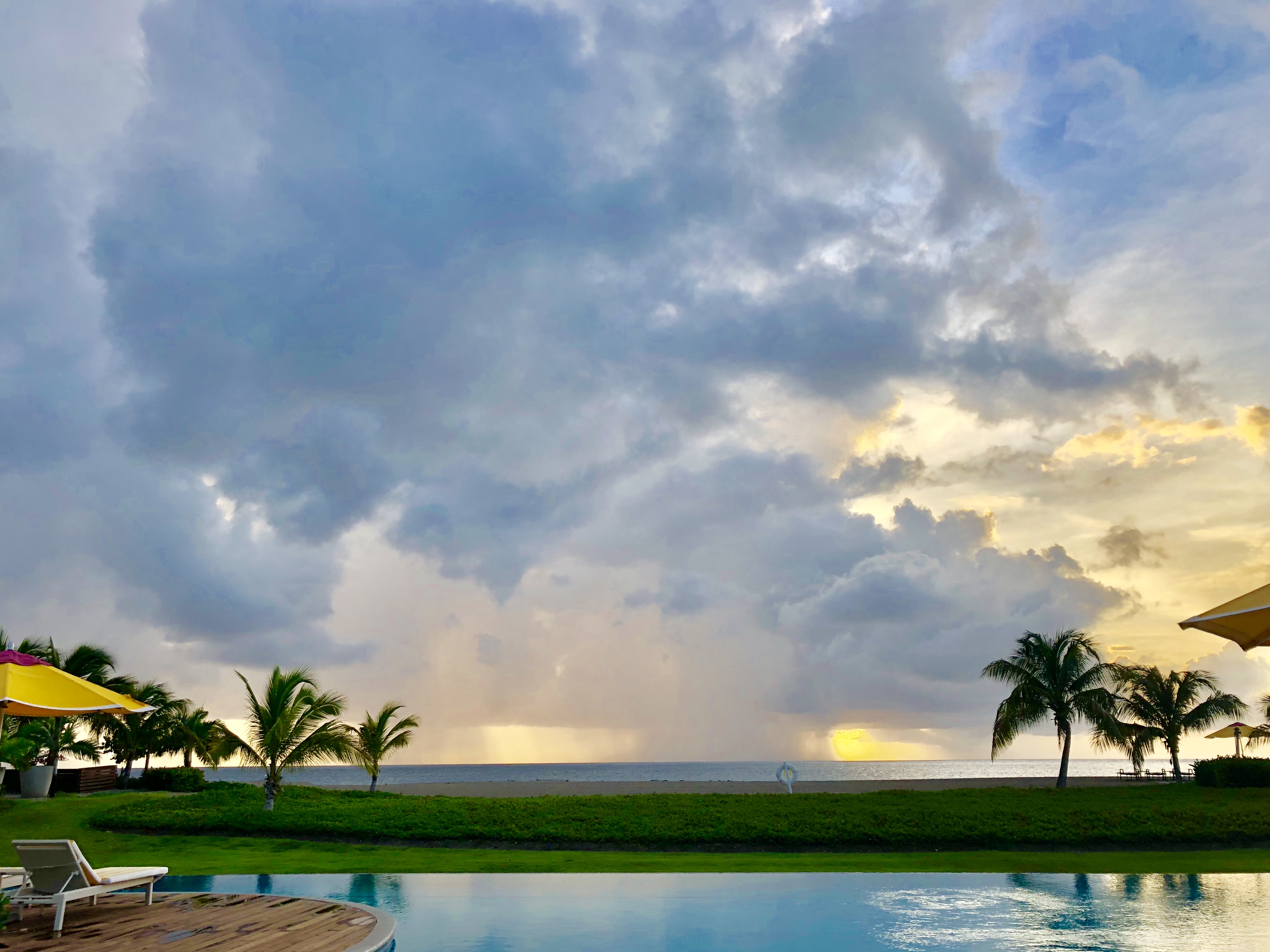 four seasons, four seasons nevis, st. kitts, nevis, caribbean, resort, hotel, ocean, pool, spa, massage, sunset, sky, blue sky