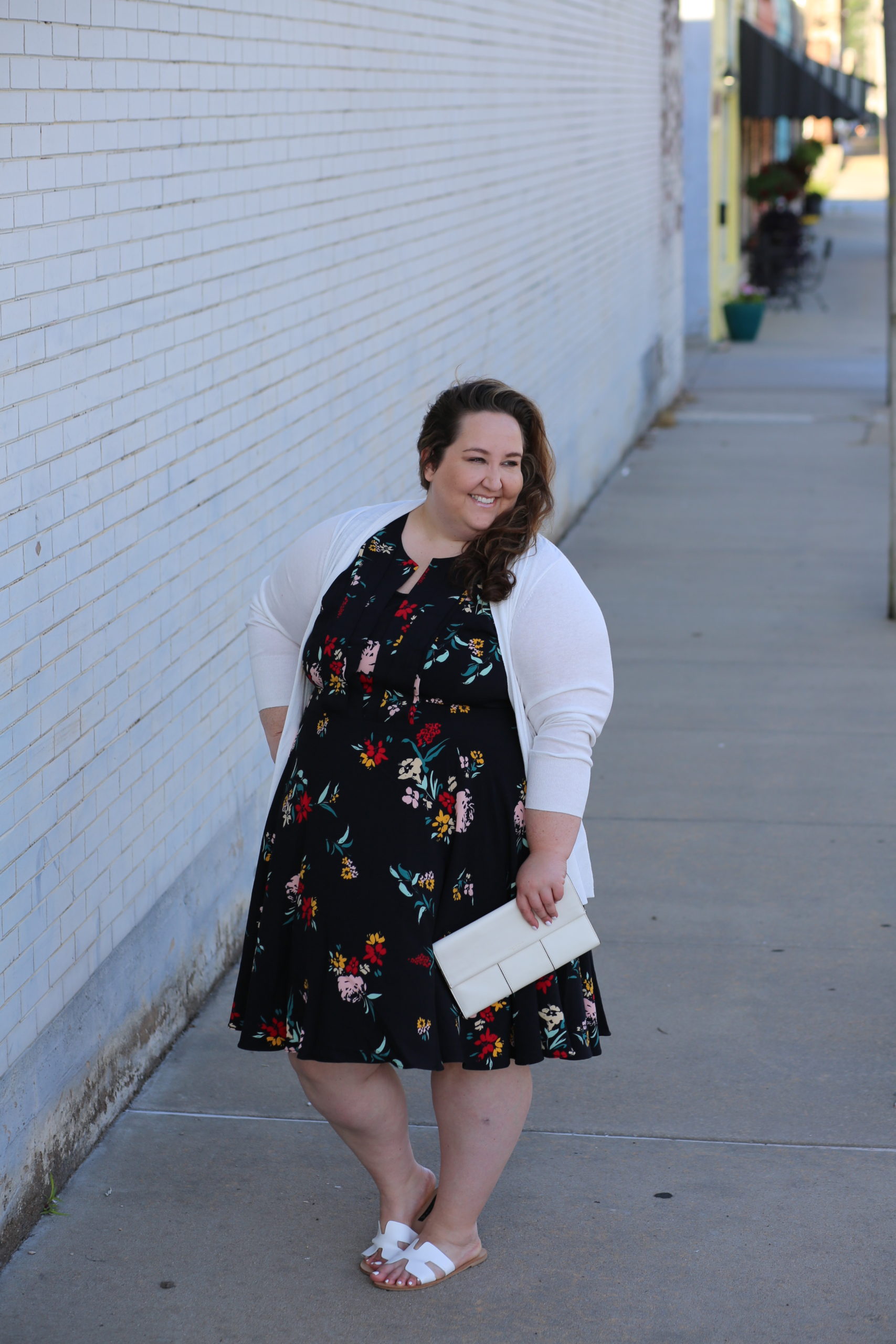 floral dress, plus size style, white cardigan, white clutch, white sandals, dia & co.